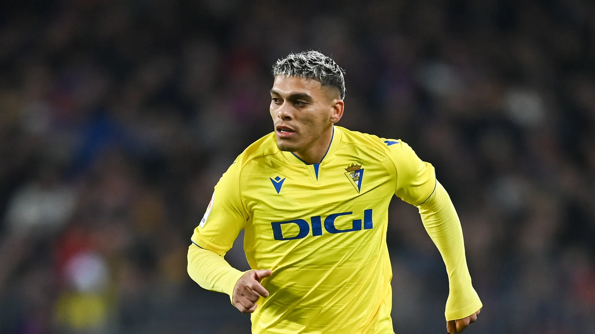 Brian Ocampo of Cadiz CF runs with the balls during the LaLiga Santander match between FC Barcelona and Cadiz CF at Spotify Camp Nou on February 19, 2023 in Barcelona, Spain. (Photo by David Ramos/Getty Images)