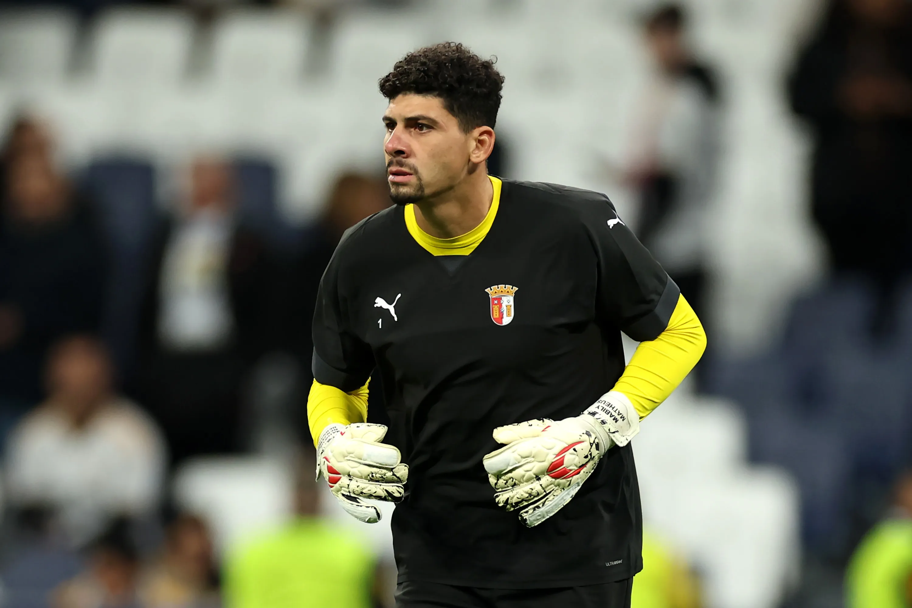 MADRID, SPAIN – NOVEMBER 08: Matheus Magalhaes of SC Braga warms up prior to the UEFA Champions League match between Real Madrid and SC Braga at Estadio Santiago Bernabeu on November 08, 2023 in Madrid, Spain. (Photo by Florencia Tan Jun/Getty Images)
