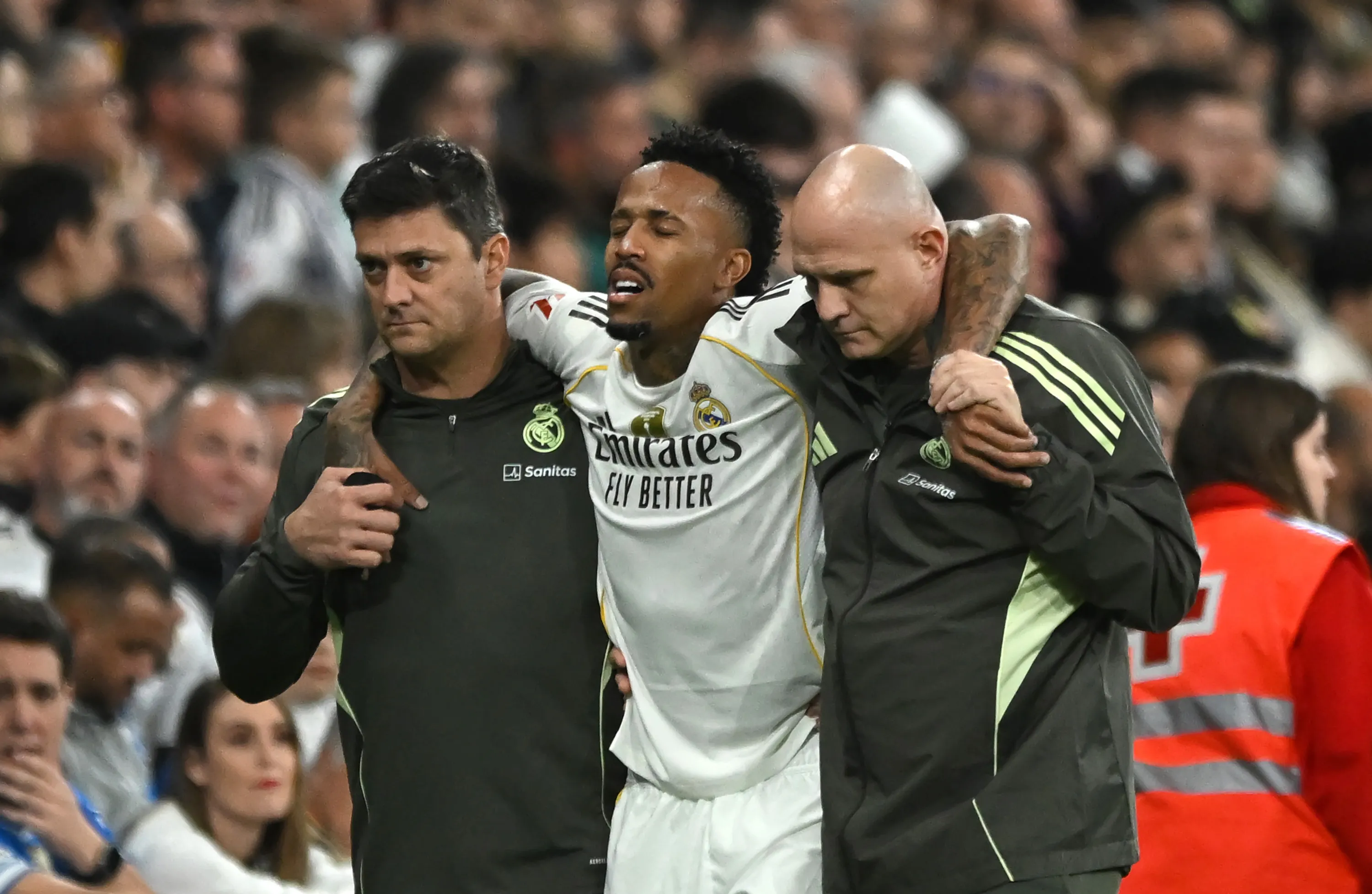 MADRID, SPAIN – DECEMBER 07: Eder Militao of Real Madrid leaves the field after suffering an injury during the LaLiga EA Sports match between Real Madrid CF and RC Celta de Vigo at Estadio Santiago Bernabeu on December 07, 2025 in Madrid, Spain. (Photo by Denis Doyle/Getty Images)