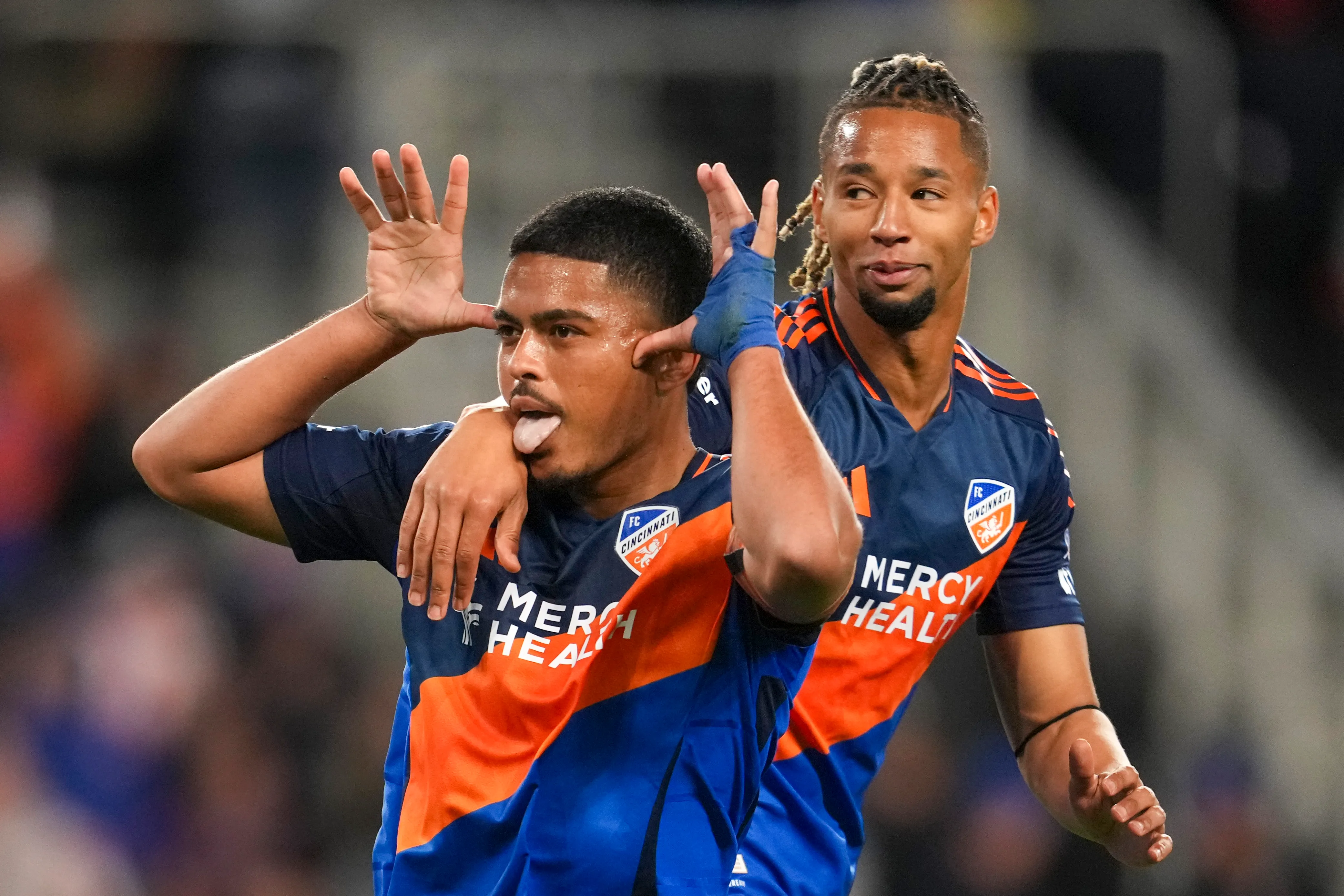 CINCINNATI, OHIO – APRIL 18: Evander #10 of FC Cincinnati celebrates scoring his team’s second goal via penalty alongside teammate Ayoub Jabbari #99 during the MLS match between FC Cincinnati and Chicago Fire FC at TQL Stadium on April 18, 2026 in Cincinnati, Ohio. (Photo by Jeff Dean/Getty Images)