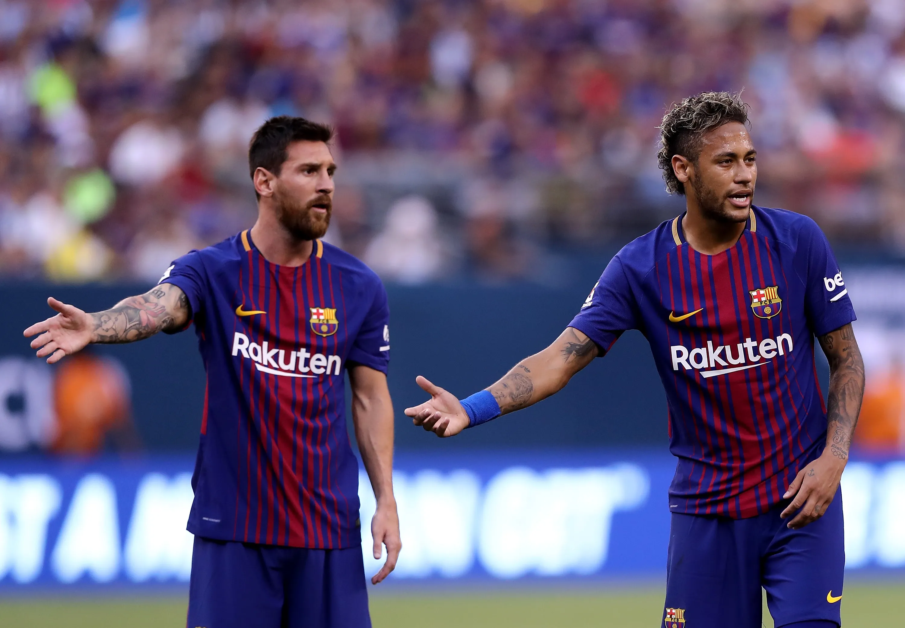 EAST RUTHERFORD, NJ – JULY 22:  Lionel Messi #10 and Neymar #11 of Barcelona react to the way Juventus lined up for a kick in the first half during the International Champions Cup 2017  on July 22, 2017 at MetLife Stadium in East Rutherford, New Jersey.  (Photo by Elsa/Getty Images)