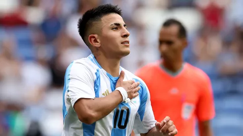 Thiago Almada of Team Argentina celebrates scoring his team's first goal during the Men's group B match between Ukraine and Argentina during the Olympic Games Paris 2024 at Stade de Lyon on July 30, 2024 in Lyon, France.