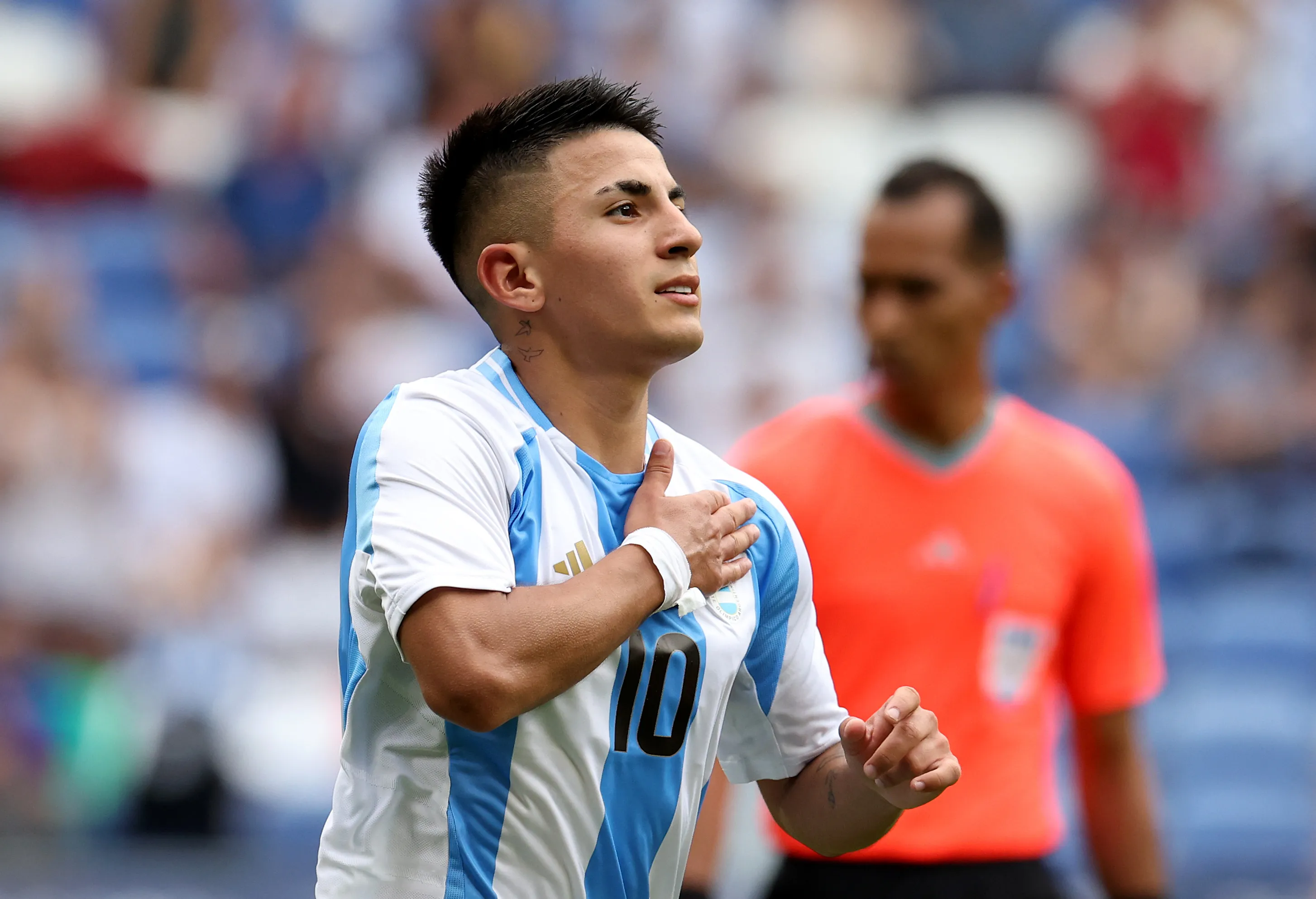 LYON, FRANCE – JULY 30: Thiago Almada #10 of Team Argentina celebrates scoring his team’s first goal during the Men’s group B match between Ukraine and Argentina during the Olympic Games Paris 2024 at Stade de Lyon on July 30, 2024 in Lyon, France. (Photo by Claudio Villa/Getty Images)