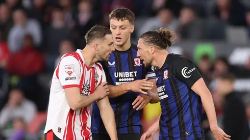 SOUTHAMPTON, ENGLAND - MAY 12: Taylor Harwood-Bellis of Southampton clashes with Luke Ayling of Middlesbrough during the Sky Bet Championship Play Off Semi Final Second Leg match between Southampton and Middlesbrough at St Mary's Stadium on May 12, 2026 in Southampton, England. (Photo by Warren Little/Getty Images)
