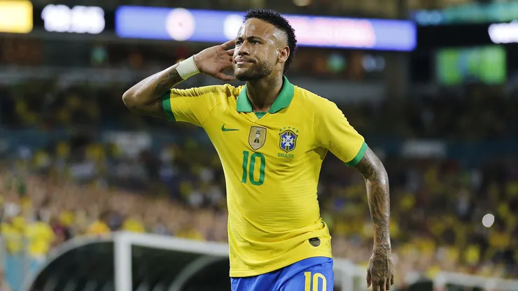 Neymar Jr. #10 of Brazil reacts after assisting Casemiro #5 on a goal against Colombia during the first half of the friendly at Hard Rock Stadium on September 06, 2019 in Miami, Florida.