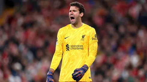 Alisson Becker of Liverpool reacts during the UEFA Champions League 2024/25 League Phase MD2 match between Liverpool FC and Bologna FC 1909 at Anfield on October 02, 2024 in Liverpool, England.