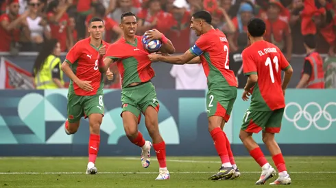 SAINT-ETIENNE, FRANCE - JULY 27: Soufiane Rahimi #9 of Team Morocco celebrates scoring his team's first goal via penalty during the Men's group B match between Ukraine and Morocco during the Olympic Games Paris 2024 at Stade Geoffroy-Guichard on July 27, 2024 in Saint-Etienne, France. (Photo by Tullio M. Puglia/Getty Images)