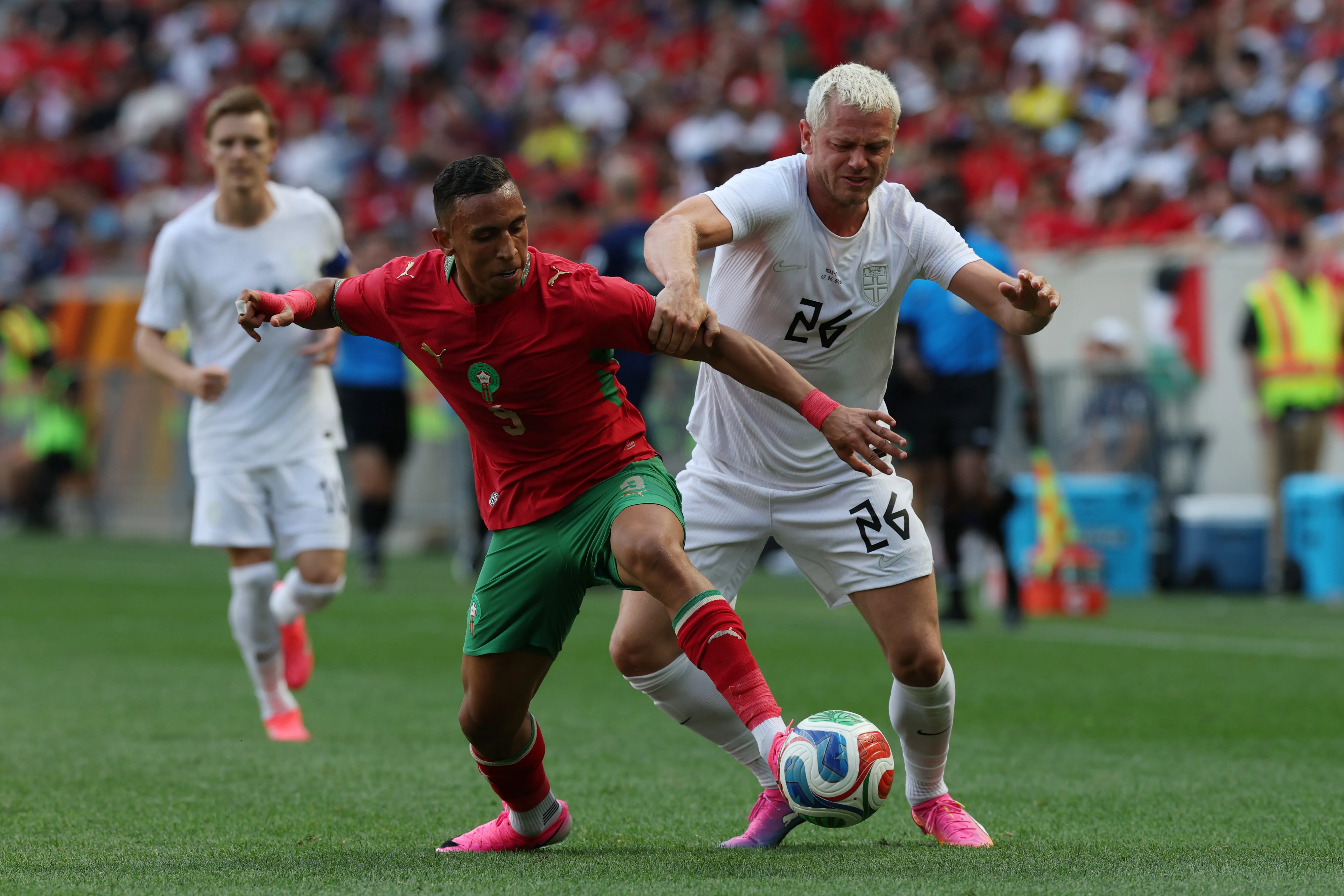 HARRISON, NEW JERSEY – JUNE 07: Soufiane Rahimi of Morocco fights for the ball with Julian Ryerson of Norway during the international friendly match between Morocco and Norway at Red Bull Arena on June 07, 2026 in Harrison, New Jersey. (Photo by Vincent Carchietta/Getty Images)