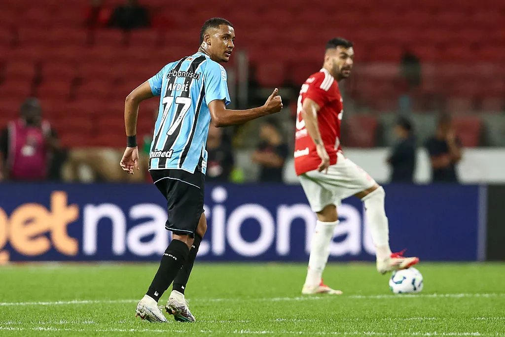 Andre Henrique of Gremio celebrates after scoring the second goal of his team during the match between Internacional and Gremio as part of Brasileirao 2025 at Beira-Rio Stadium on September 21, 2025 in Porto Alegre, Brazil. (Photo by Pedro H. Tesch/Getty Images)