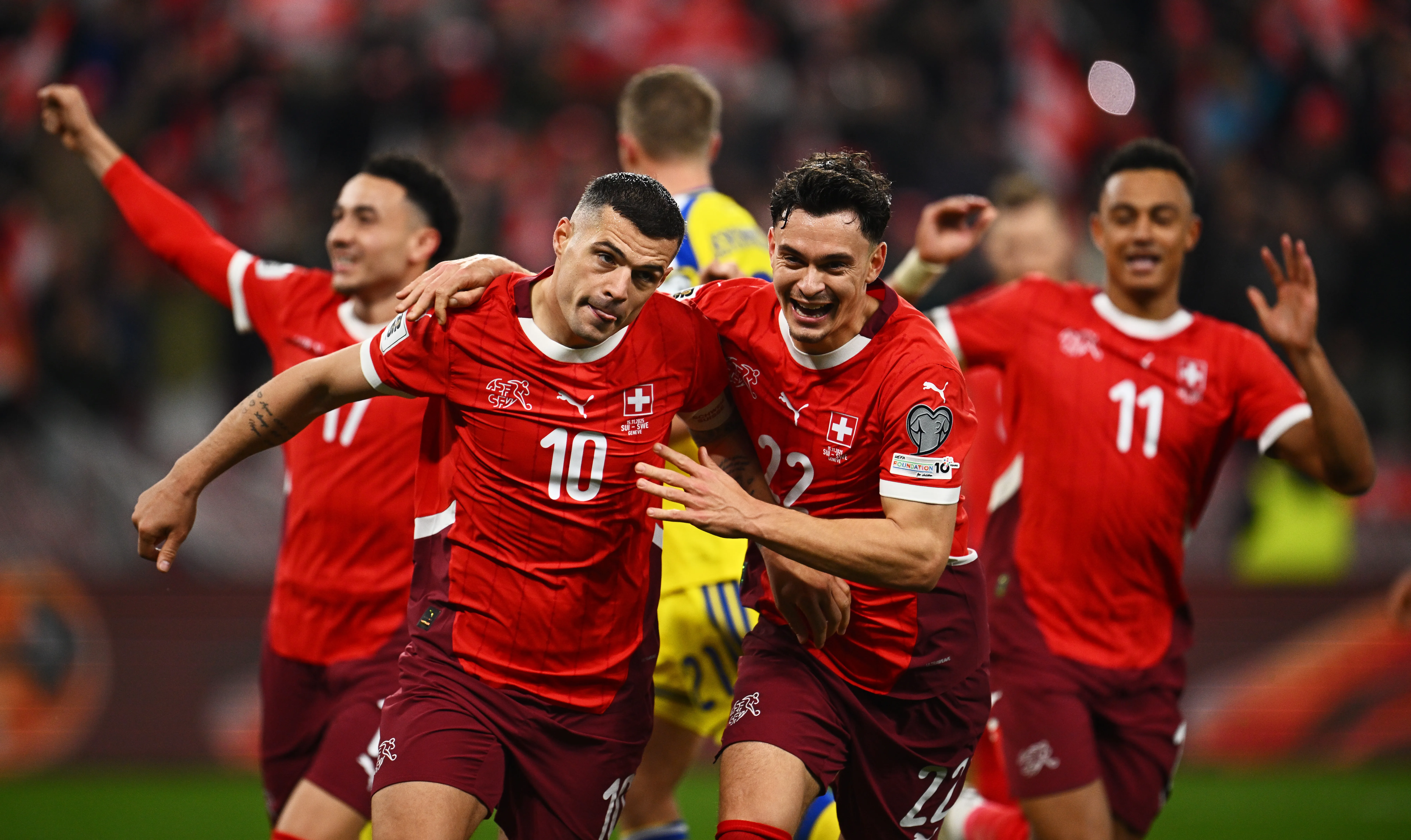 GENEVA, SWITZERLAND – NOVEMBER 15: Granit Xhaka of Switzerland celebrates scoring his team’s second goal with his teammate Fabian Rieder during the FIFA World Cup 2026 qualifier match between Switzerland and Sweden at Stade de Geneve on November 15, 2025 in Geneva, Switzerland. (Photo by Mattia Ozbot/Getty Images)