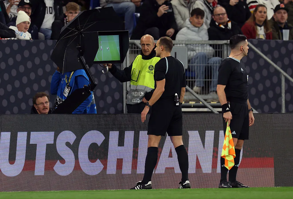 Referee Nenad Minakovic check the VAR screen during the FIFA World Cup 2026 Qualifier match between Germany and Luxembourg at PreZero-Arena on October 10, 2025 in Sinsheim, Germany. (Photo by Alexander Hassenstein/Getty Images)