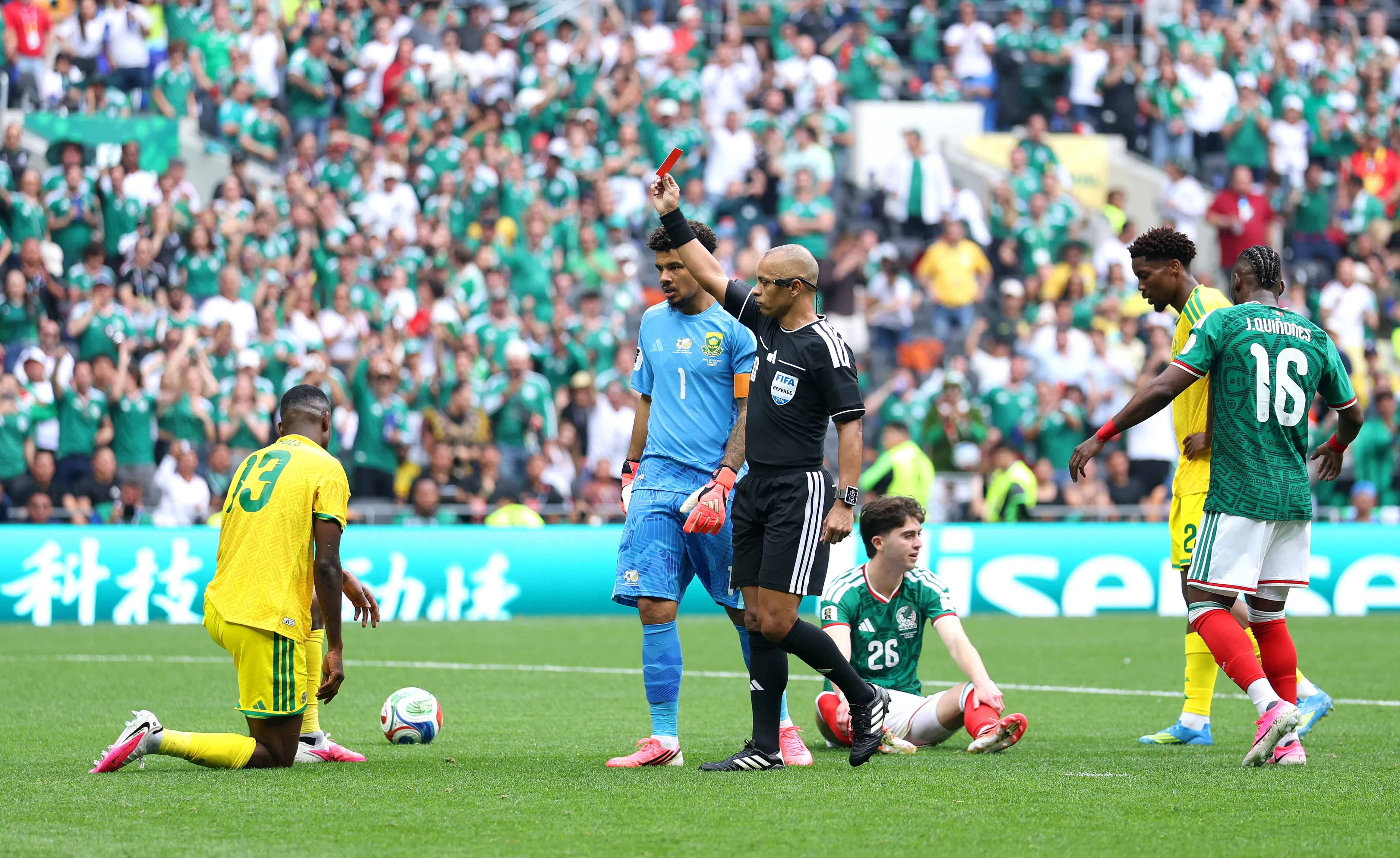 Referee Wilton Sampaio issues a red card to Sphephelo Sithole #13 of South Africa during the FIFA World Cup 2026 Group A match between Mexico and South Africa at Mexico City Stadium on June 11, 2026 in Mexico City, Mexico. (Photo by Carl Recine/Getty Images)