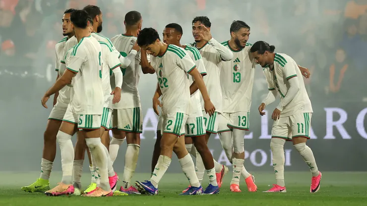 ROTTERDAM, NETHERLANDS - JUNE 03: Anis Hadj Moussa of Algeria celebrates scoring his team's first goal with teammates during the international friendly match between Netherlands and Algeria at De Kuip on June 03, 2026 in Rotterdam, Netherlands. (Photo by Dean Mouhtaropoulos/Getty Images)