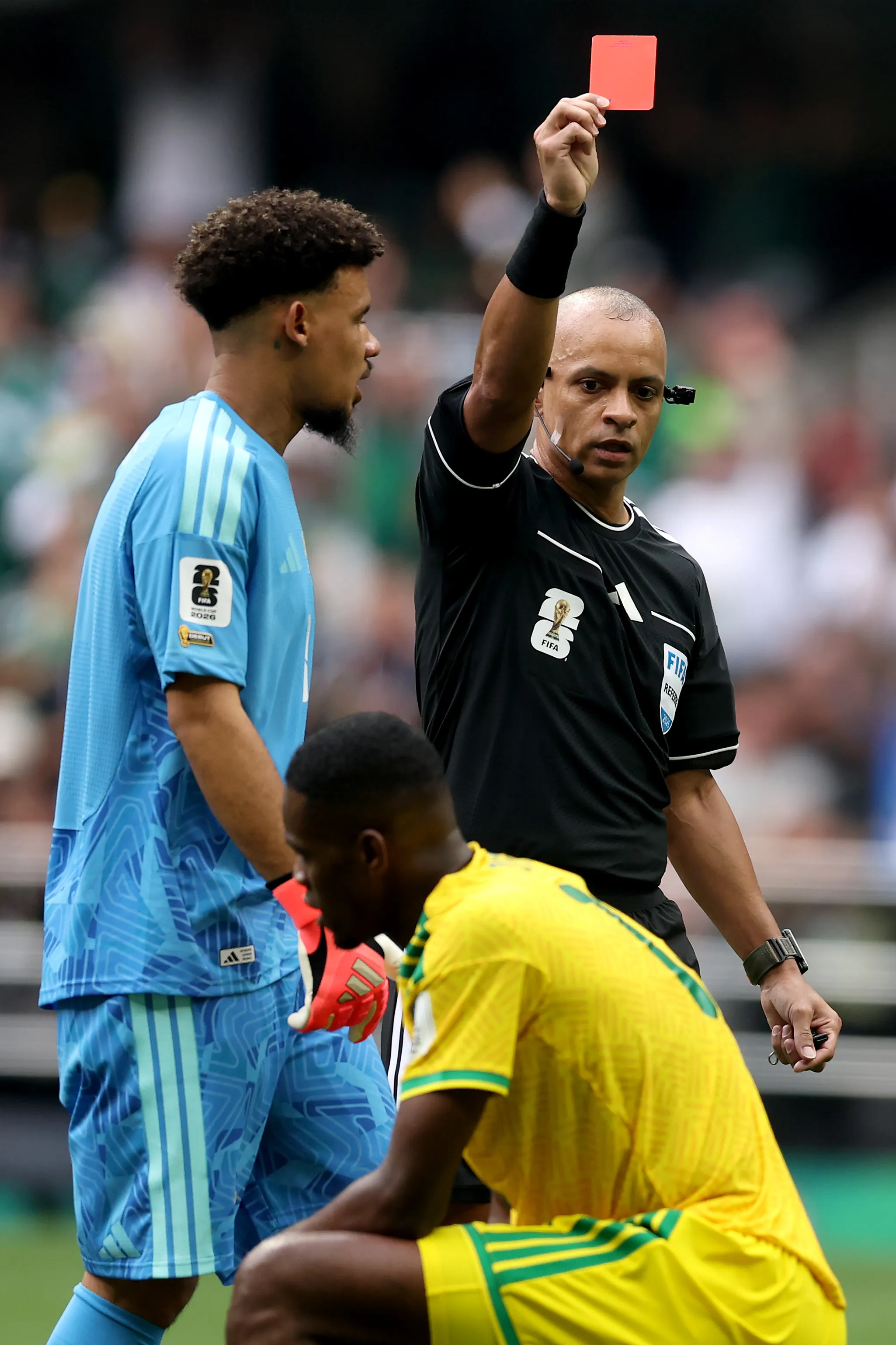 MEXICO CITY, MEXICO – JUNE 11: Referee Wilton Sampaio issues a red card to Sphephelo Sithole #13 of South Africa during the FIFA World Cup 2026 Group A match between Mexico and South Africa at Mexico City Stadium on June 11, 2026 in Mexico City, Mexico. (Photo by Luke Hales/Getty Images)