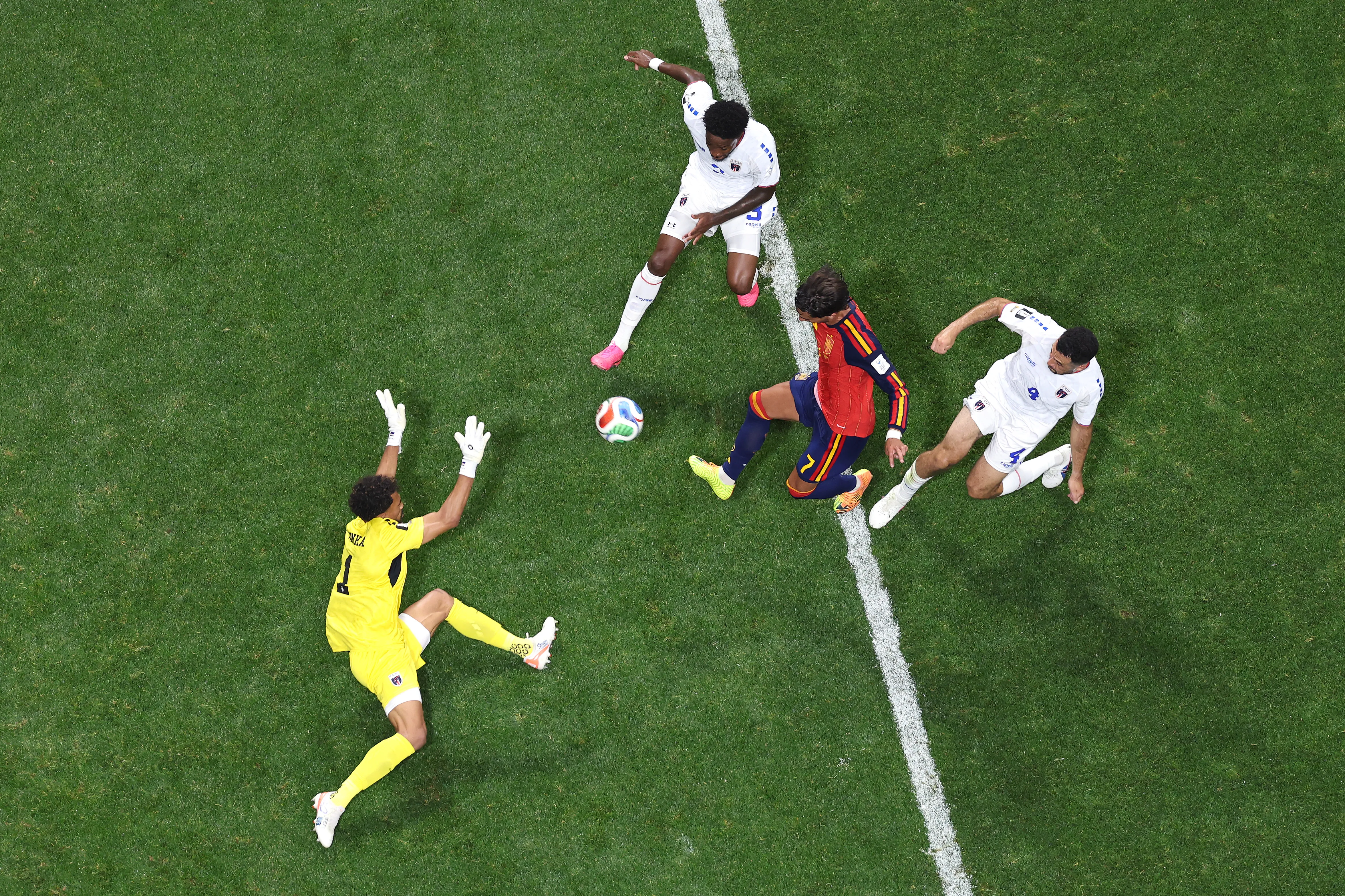 ATLANTA, GEORGIA – JUNE 15: Ferran Torres #7 of Spain shoots against Vozinha #1, Diney Borges #3 and Pico Lopes #4 of Cabo Verde during the FIFA World Cup 2026 Group H match between Spain and Cabo Verde at Atlanta Stadium on June 15, 2026 in Atlanta, Georgia. (Photo by Justin Setterfield/Getty Images)