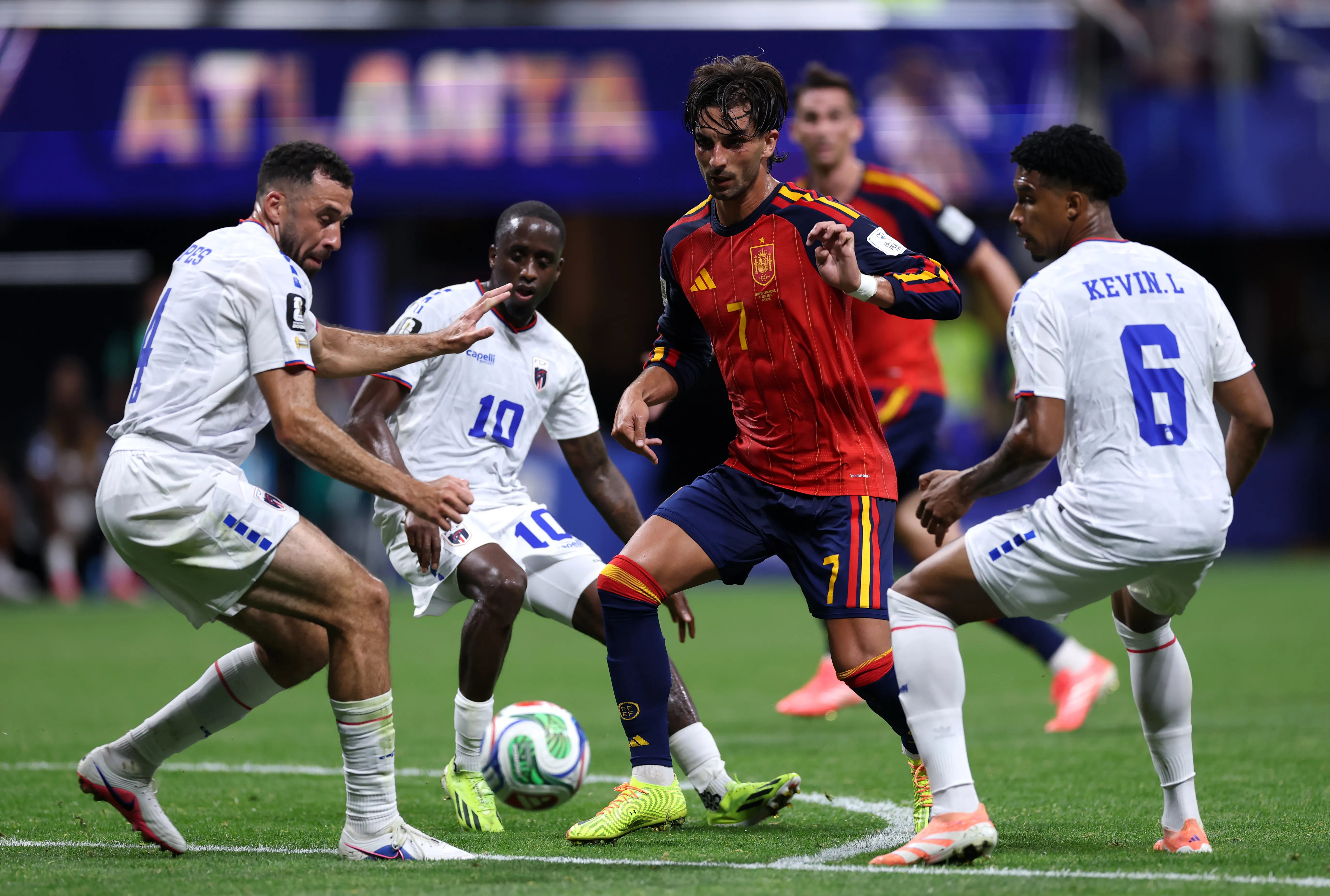ATLANTA, GEORGIA – JUNE 15: Ferran Torres #7 of Spain controls the ball under pressure from Pico Lopes #4 and Kevin Pina #6 of Cabo Verde during the FIFA World Cup 2026 Group H match between Spain and Cabo Verde at Atlanta Stadium on June 15, 2026 in Atlanta, Georgia. (Photo by Mattia Ozbot/Getty Images)