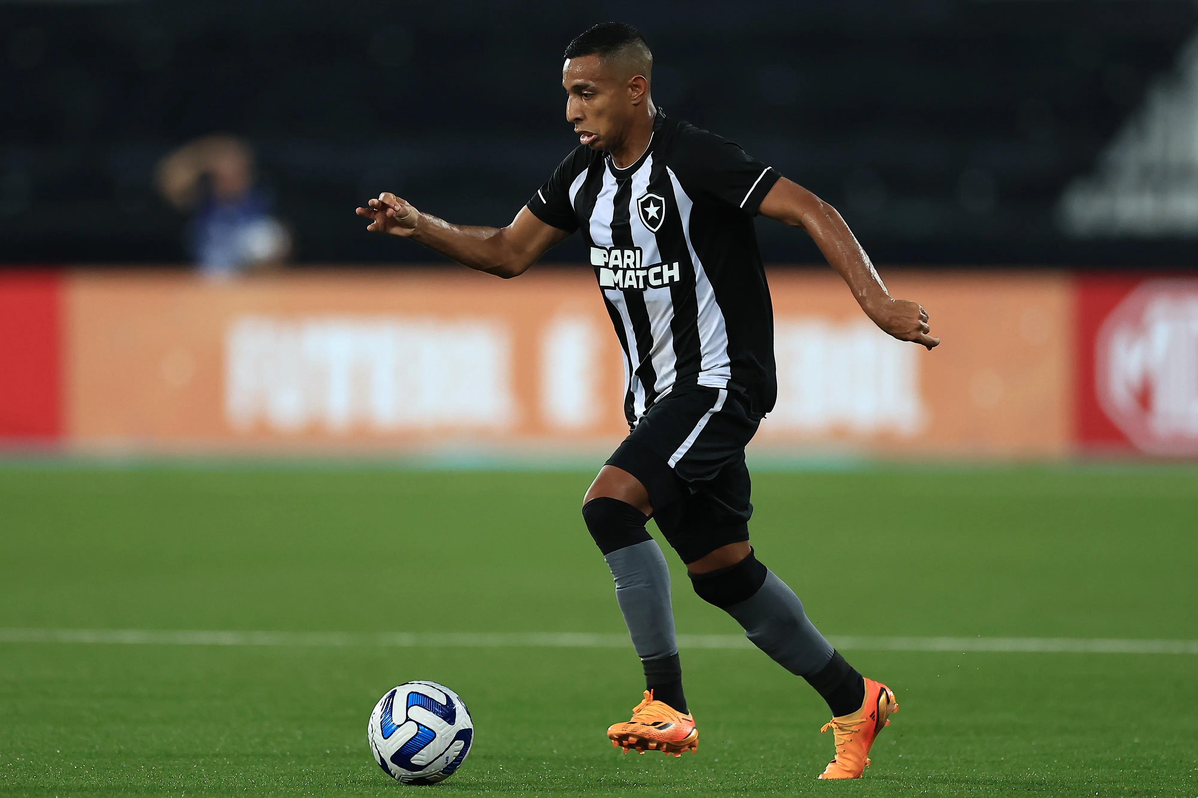 RIO DE JANEIRO, BRAZIL – MAY 04: Victor Sa of Botafogo runs with the ball during a Copa CONMEBOL Sudamericana 2023 match between Botafogo and Liga Deportiva Universitaria at Estadio Olímpico Nilton Santos on May 04, 2023 in Rio de Janeiro, Brazil. (Photo by Buda Mendes/Getty Images)