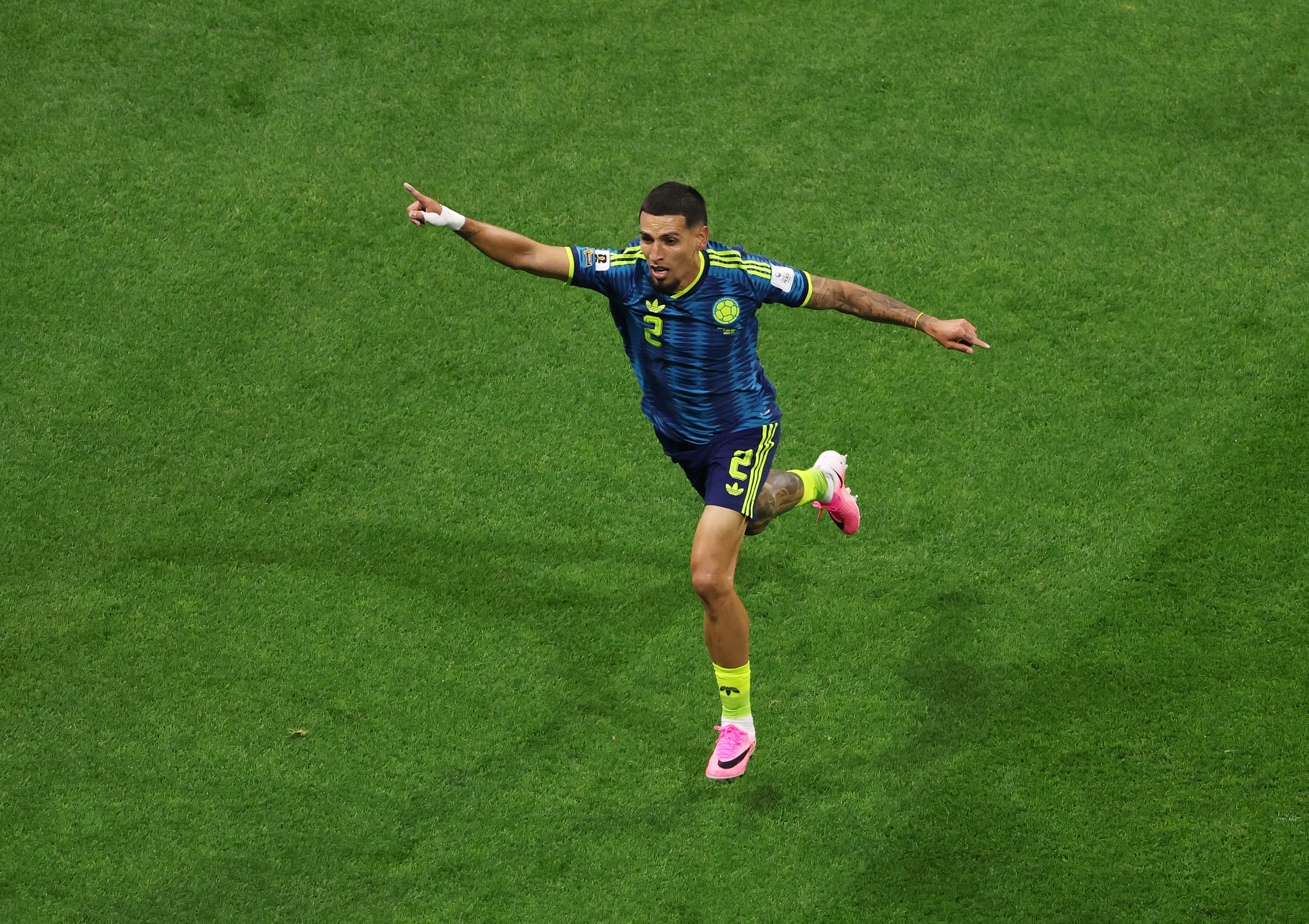 MEXICO CITY, MEXICO – JUNE 17: Daniel Munoz #2 of Colombia celebrates scoring his team’s first goal during the FIFA World Cup 2026 Group K match between Uzbekistan and Colombia at Mexico City Stadium on June 17, 2026 in Mexico City, Mexico. (Photo by Luke Hales/Getty Images)