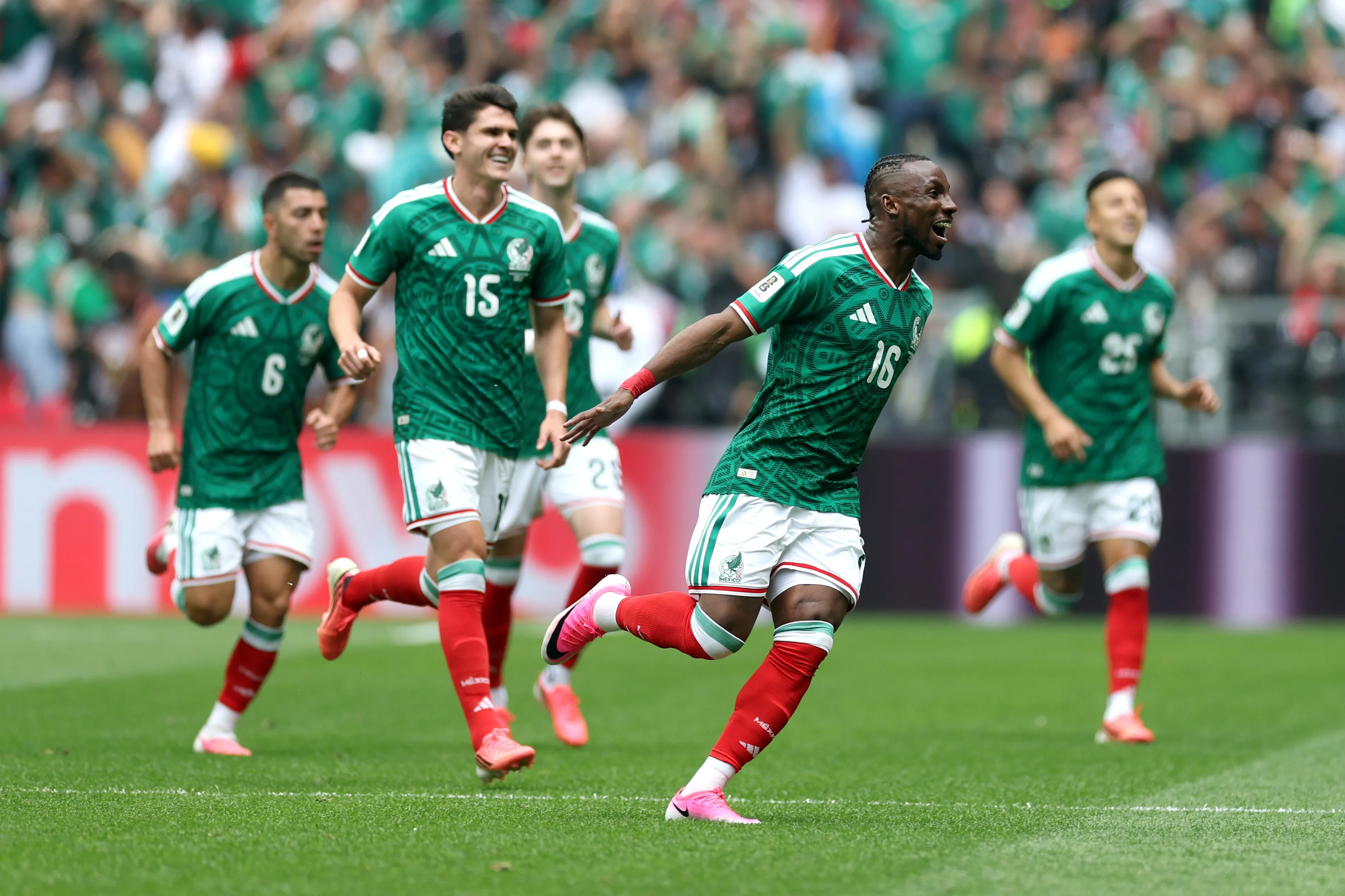 MEXICO CITY, MEXICO – JUNE 11: Julian Quinones #16 of Mexico celebrates with teammates after scoring the team’s first goal during the FIFA World Cup 2026 Group A match between Mexico and South Africa at Mexico City Stadium on June 11, 2026 in Mexico City, Mexico. (Photo by Carl Recine/Getty Images)