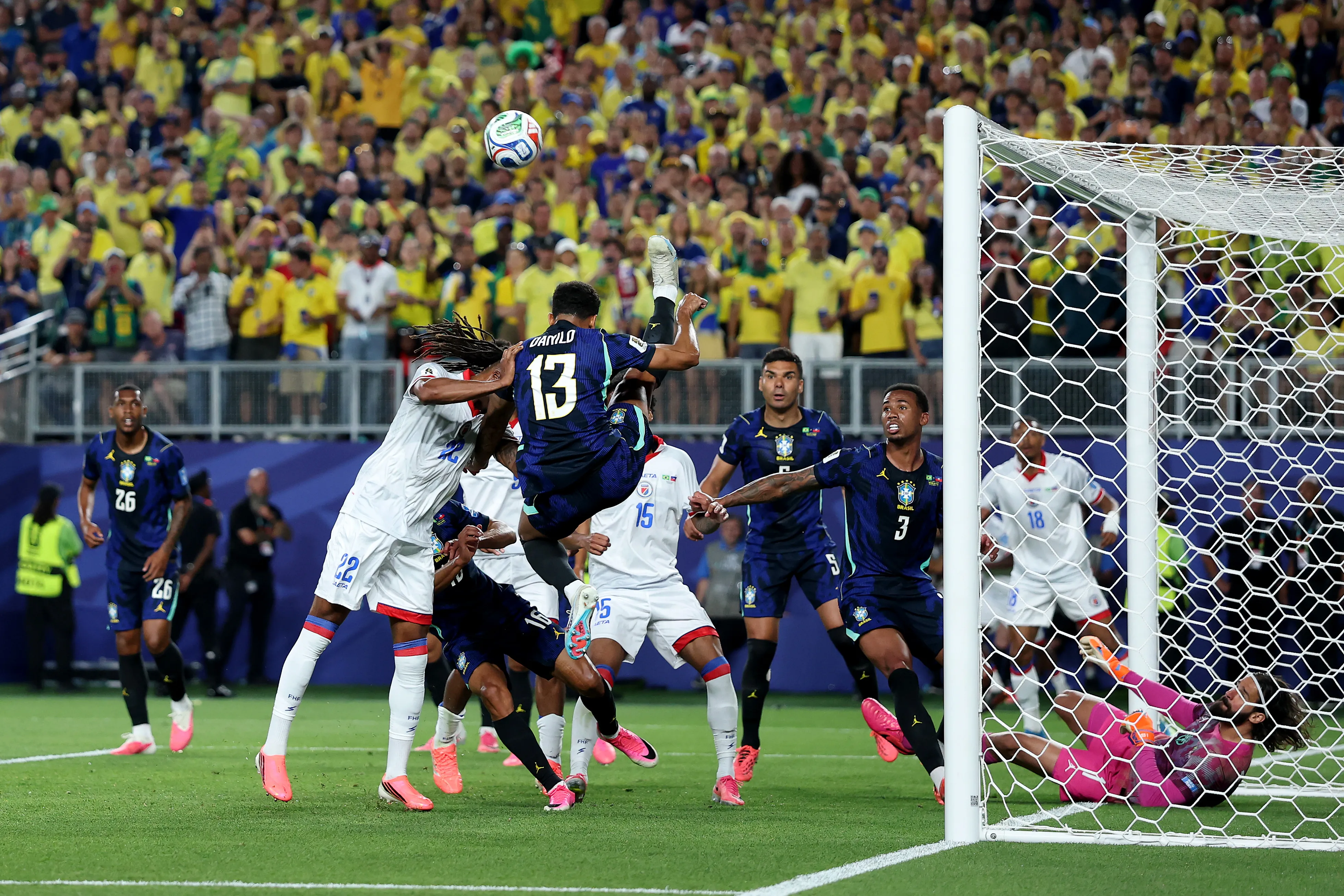 PHILADELPHIA, PENNSYLVANIA – JUNE 19: Danilo #13 of Brazil competes for a header against Jean-Kevin Duverne #22 of Haiti during the FIFA World Cup 2026 Group C match between Brazil and Haiti at Philadelphia Stadium on June 19, 2026 in Philadelphia, Pennsylvania. (Photo by Al Bello/Getty Images)
