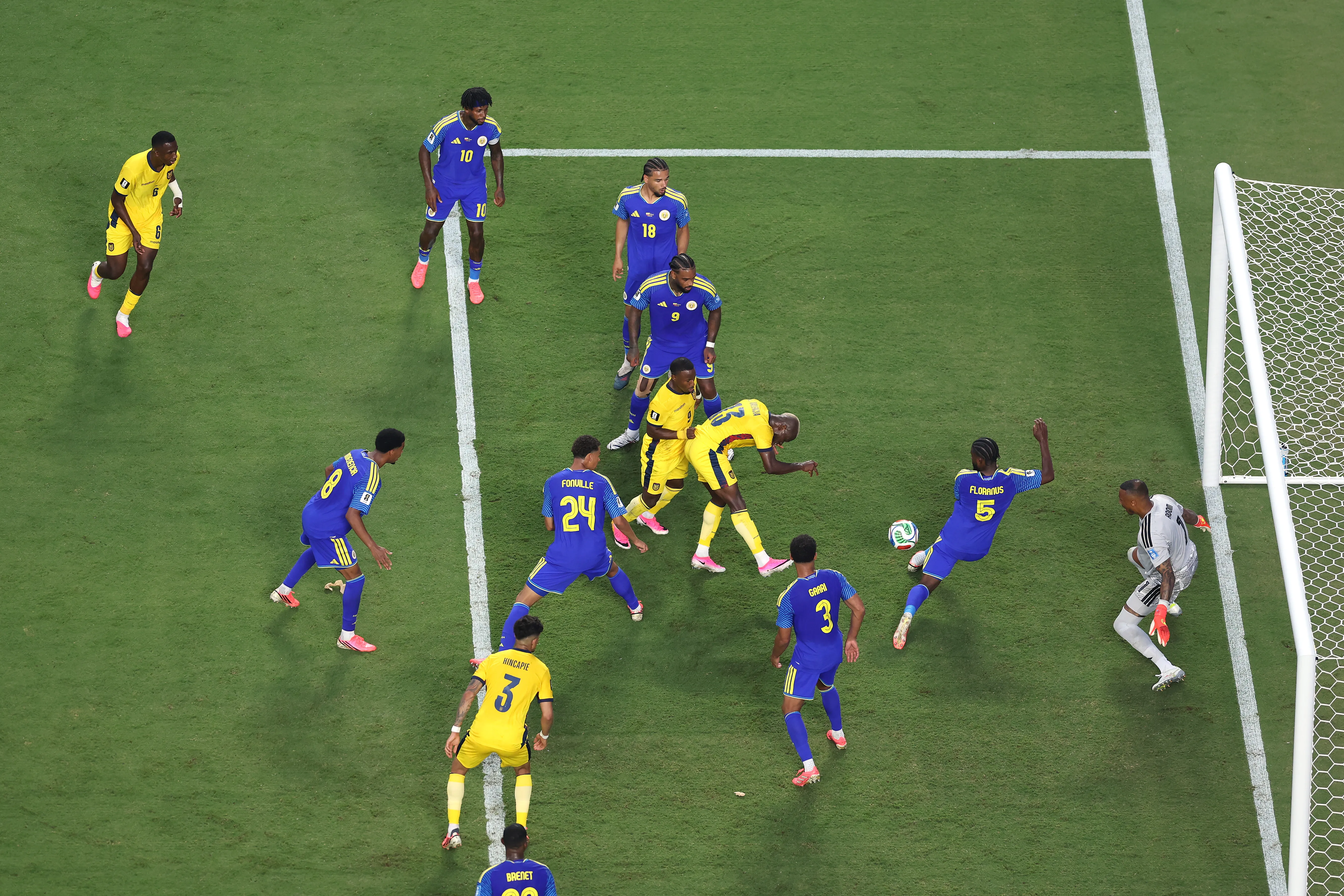 KANSAS CITY, MISSOURI – JUNE 20: Sherel Floranus #5 and Eloy Room #1 of Curacao defend an attempt by Enner Valencia #13 of Ecuador during the FIFA World Cup 2026 Group E match between Ecuador and Curacao at Kansas City Stadium on June 20, 2026 in Kansas City, Missouri. (Photo by Michael Steele/Getty Images)