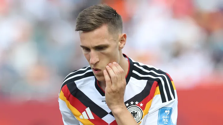 Nico Schlotterbeck #15 of Germany reacts after receiving medical attention during the FIFA World Cup 2026 Group E match between Germany and Cote D'Ivoire at Toronto Stadium on June 20, 2026 in Toronto, Ontario. (Photo by Alexander Hassenstein/Getty Images)