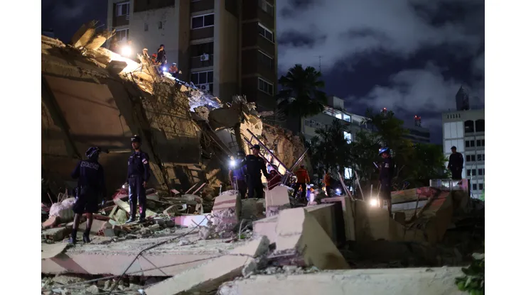 CARACAS, VENEZUELA - JUNE 24: First responders attend a damaged building at Los Palos Grandes after a magnitude 7.2 earthquake struck Venezuela and other regions in the Caribbean on June 24, 2026 in Caracas, Venezuela. According to the U.S. Geological Survey (USGS), the main earthquake was followed by a 7.5-magnitude aftershock less than a minute later; although some buildings collapsed, the number of victims remains unknown. (Photo by Jesus Vargas/Getty Images)