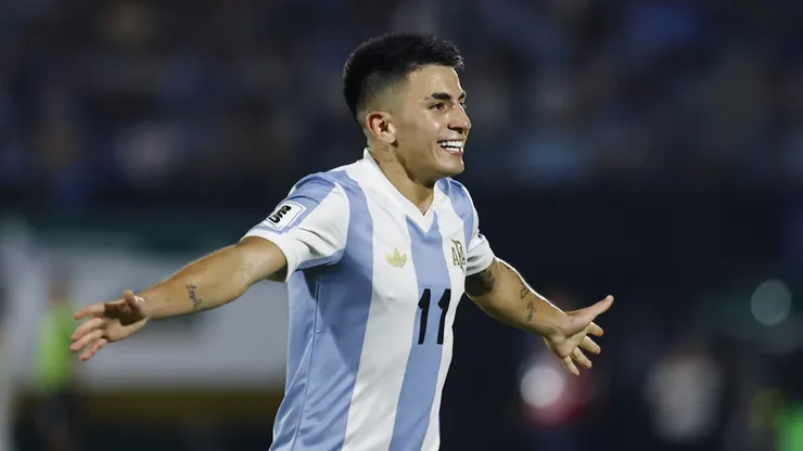 MONTEVIDEO, URUGUAY - MARCH 21: Thiago Almada of Argentina celebrates after scoring the team's first goal during the South of American FIFA World Cup 2026 Qualifier match between Uruguay and Argentina at Centenario Stadium on March 21, 2025 in Montevideo, Uruguay. (Photo by Ernesto Ryan/Getty Images)