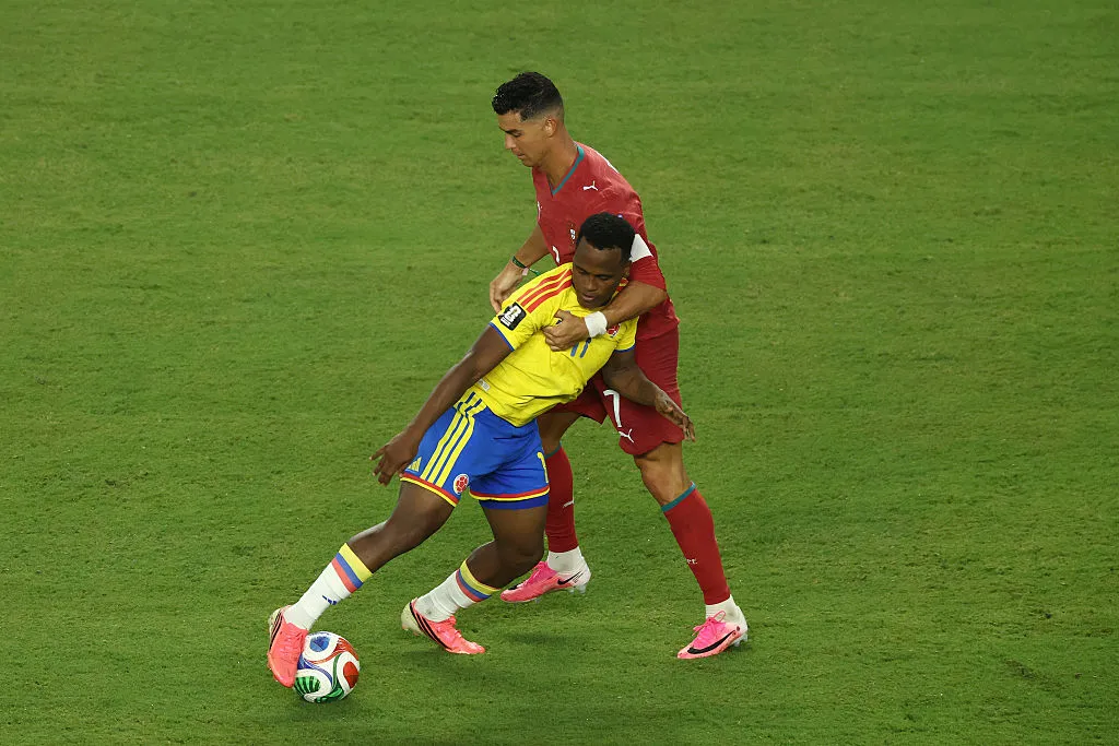 MIAMI GARDENS, FLORIDA – JUNE 27: Jhon Arias #11 of Colombia is challenged by Cristiano Ronaldo #7 of Portugal during the FIFA World Cup 2026 Group K match between Colombia and Portugal at Miami Stadium on June 27, 2026 in Miami Gardens, Florida. (Photo by Megan Briggs/Getty Images)