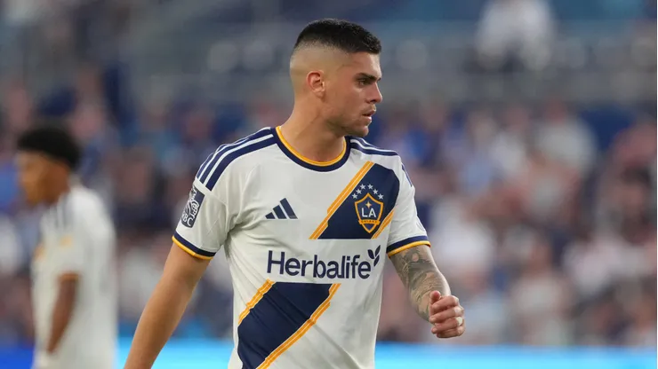 KANSAS CITY, KANSAS - MAY 13: Midfielder Gabriel Pec #11 of the LA Galaxy in action against the Sporting Kansas City in the first half at Sporting Park on May 13, 2026 in Kansas City, Kansas. (Photo by Ed Zurga/Getty Images)
