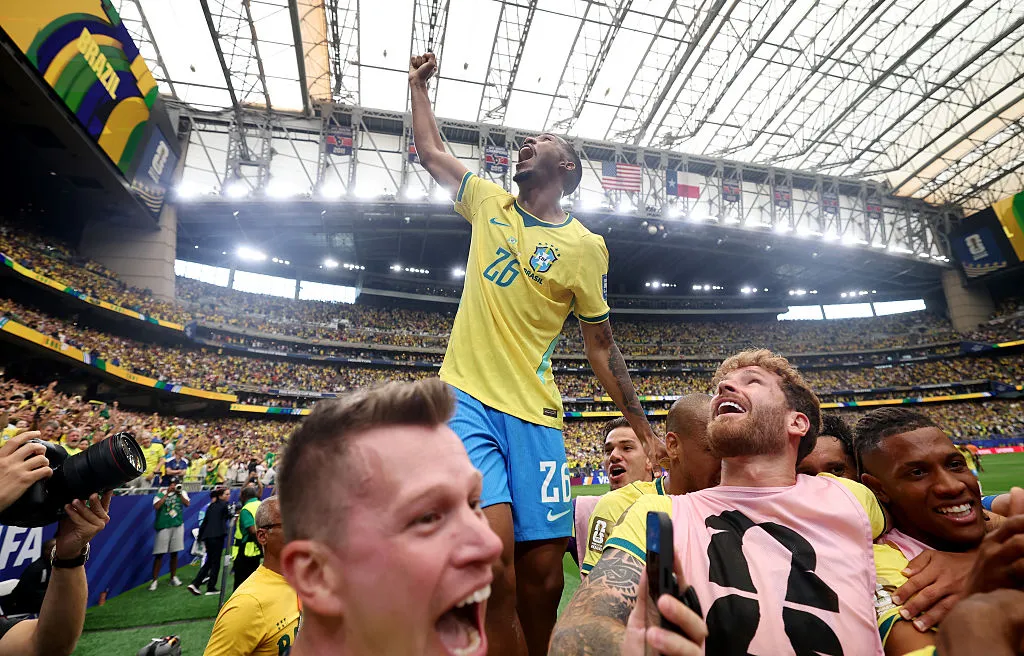 HOUSTON, TEXAS – JUNE 29: Rayan #26 of Brazil celebrates after the team’s second goal by Gabriel Martinelli #22 during the FIFA World Cup 2026 Round Of 32 match between Brazil and Japan at Houston Stadium on June 29, 2026 in Houston, Texas. (Photo by Lars Baron/Getty Images)