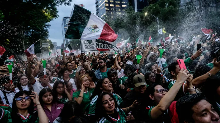 MEXICO CITY, MEXICO - JUNE 24: Mexican fans shout and celebrate as they watch the game during a celebration after Mexico's victory against Czechia at Angel de la Independencia on June 24, 2026 in Mexico City, Mexico. (Photo by Hector Quintanar/Getty Images)