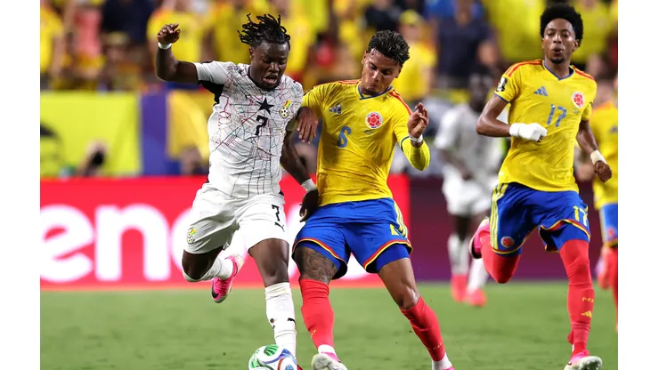 KANSAS CITY, MISSOURI - JULY 03: Fatawu Issahaku #7 of Ghana competes for the ball against Richard Rios #6 of Colombia during the FIFA World Cup 2026 Round of 32 match between Colombia and Ghana at Kansas City Stadium on July 03, 2026 in Kansas City, Missouri. (Photo by Luke Hales/Getty Images)