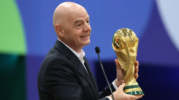 DALLAS, TEXAS - JUNE 01: FIFA President Gianni Infantino holds the FIFA World Cup winner's trophy while speaking during the FIFA World Cup 2026 International Broadcast Center Grand Opening ceremony on June 01, 2026 in Dallas, Texas. (Photo by Sam Hodde/Getty Images)