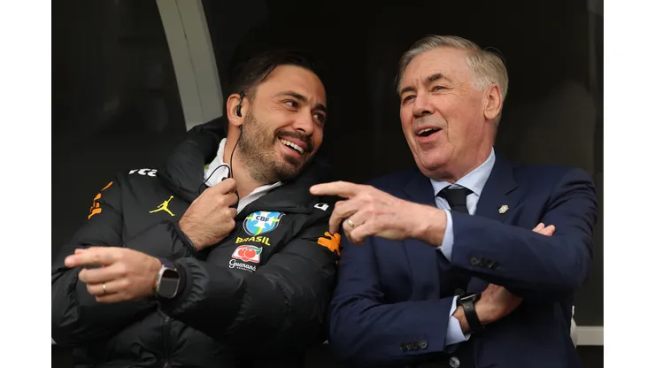 FOXBOROUGH, MASSACHUSETTS - MARCH 26: Carlo Ancelotti, Head Coach of Brazil, chats with his assistant coach Davide Ancelotti during the international friendly match between Brazil and France at Gillette Stadium on March 26, 2026 in Foxborough, Massachusetts. (Photo by Maddie Meyer/Getty Images)