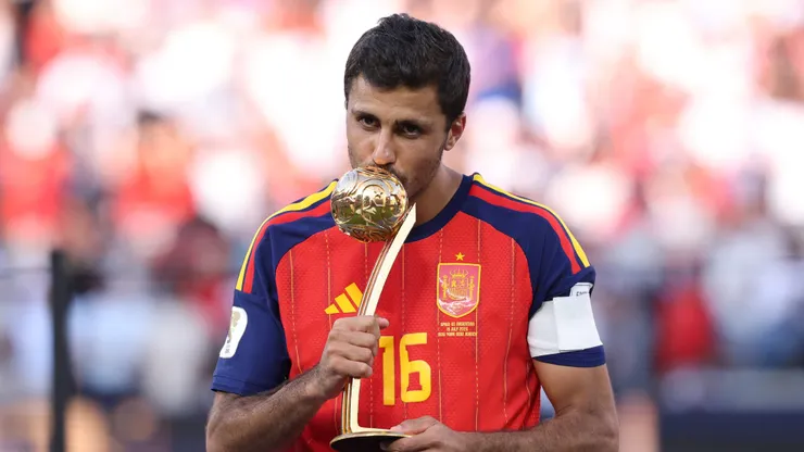 EAST RUTHERFORD, NEW JERSEY - JULY 19: Rodri #16 of Spain is presented with the Golden Ball award after the FIFA World Cup 2026 Final match between Spain and Argentina at New York New Jersey Stadium on July 19, 2026 in East Rutherford, New Jersey. (Photo by Carl Recine/Getty Images)